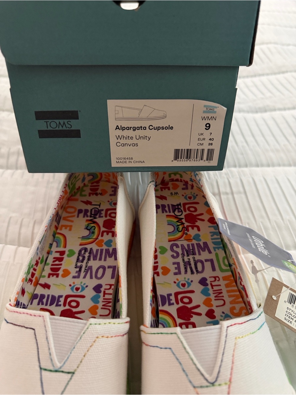 TOMS White Canvas Slip-Ons with Rainbow Pride Insole - Picture 5 of 9
